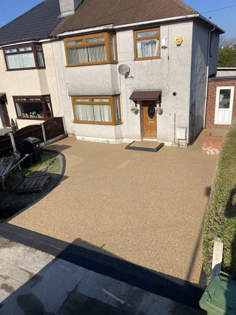 41m² Aurora resin driveway with charcoal entrance border in Ashton-under-Lyne