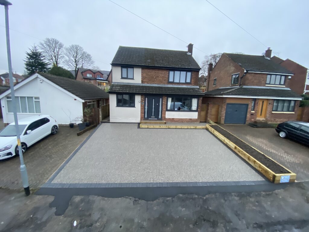 resin driveways Manchester with block border feature installed by Solid Ground