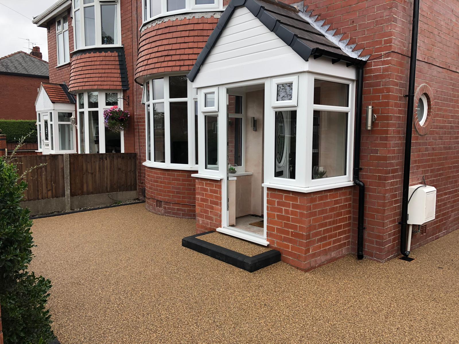 Closer view of the completed Cappuccino resin driveway and charcoal-edged entrance in Failsworth