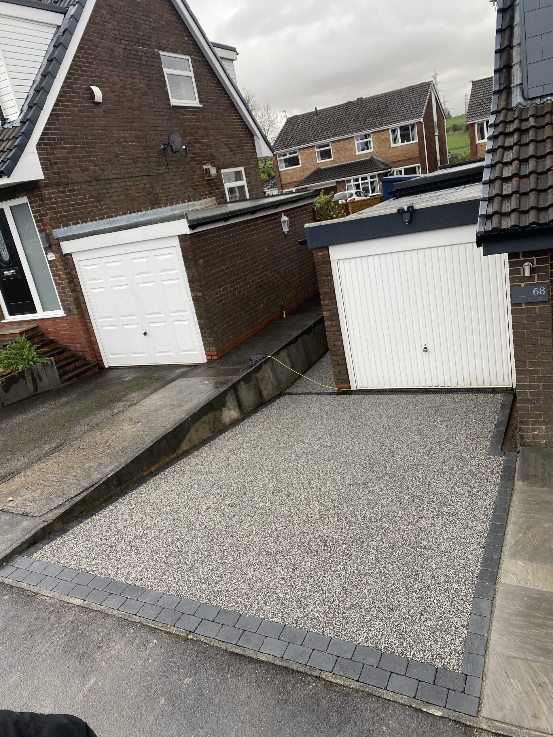 Approximately 20m² Eclipse resin driveway with charcoal edging in Bredbury