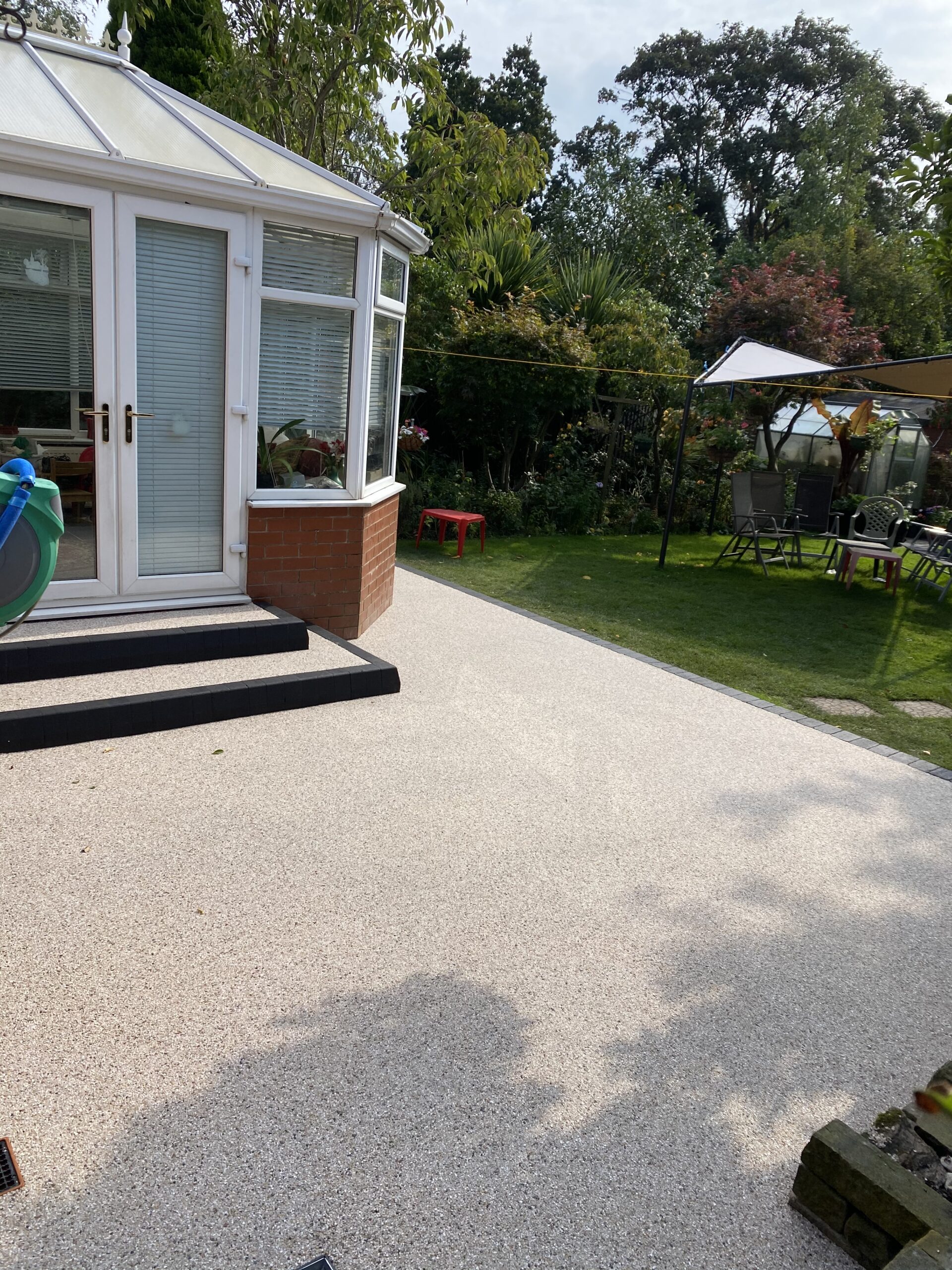 Approximately 30m² Glacier resin patio project in Romiley after full dig-out