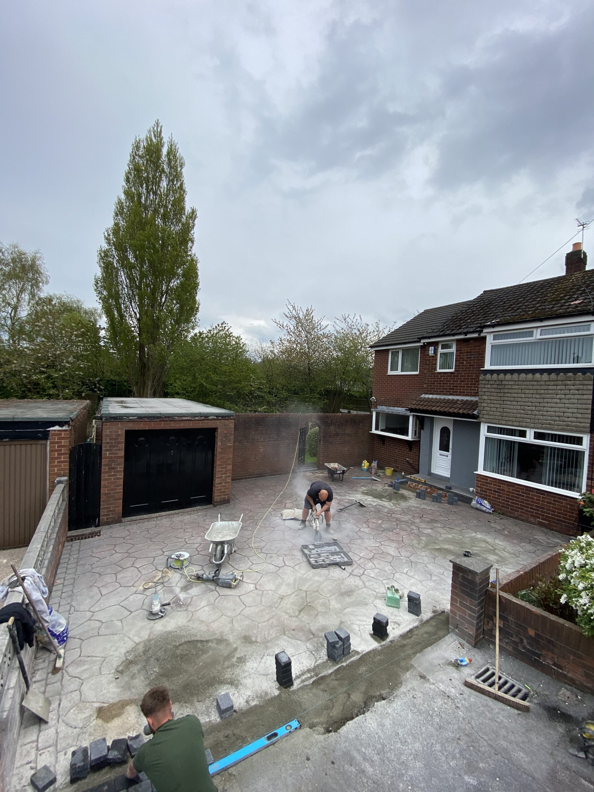 52m² Eclipse resin driveway overlay in Denton with charcoal border blocks