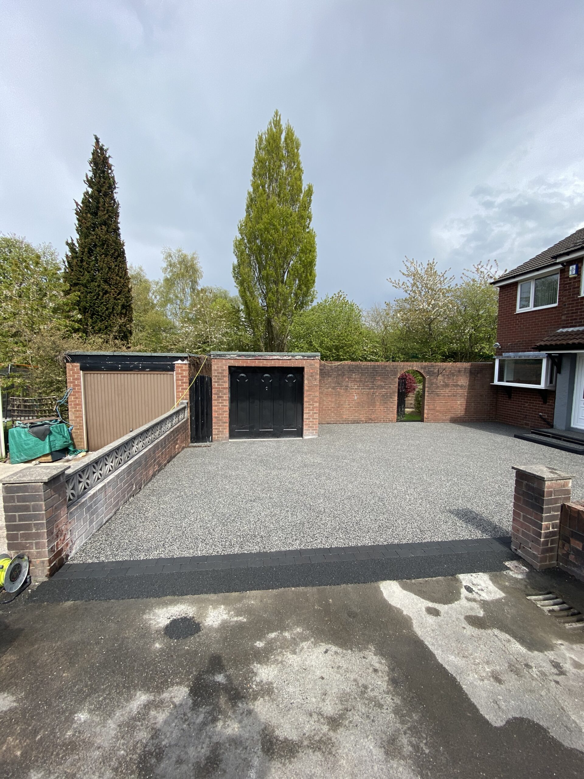 Eclipse resin driveway overlay with charcoal border blocks in Denton