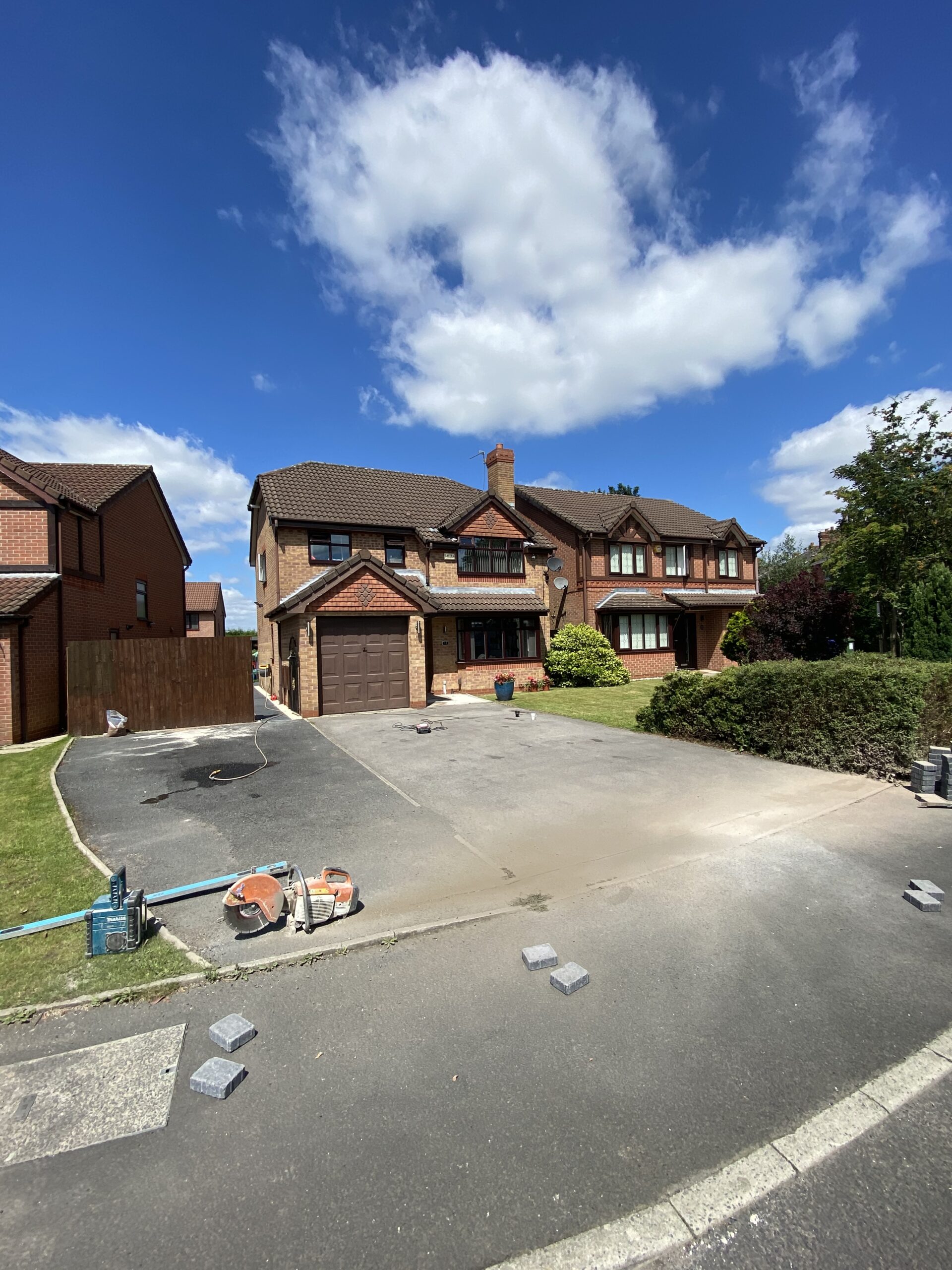 Large driveway in Dukinfield before grey resin installation