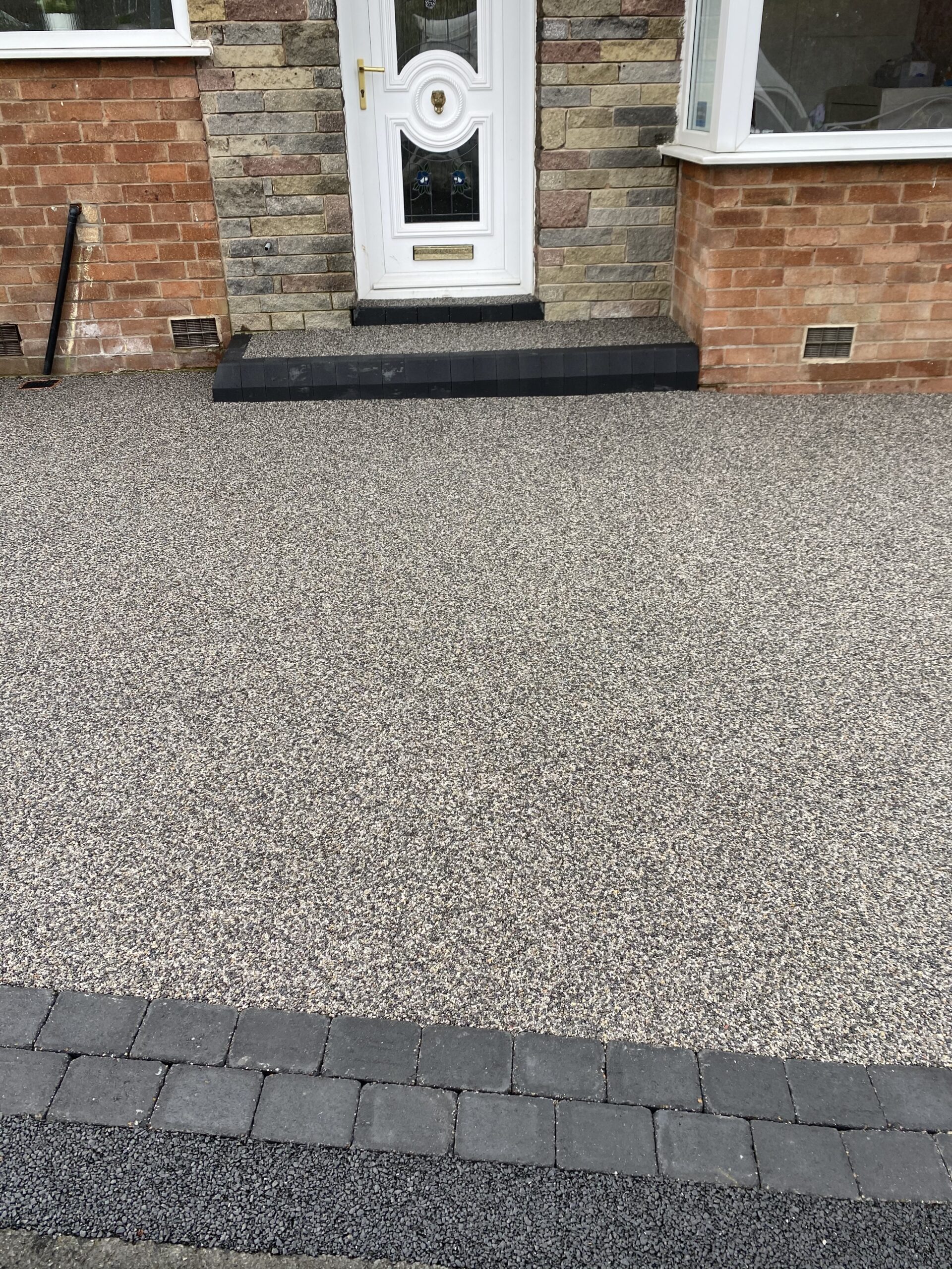 Grey resin bound driveway finish completed by Solid Ground in Gee Cross Hyde