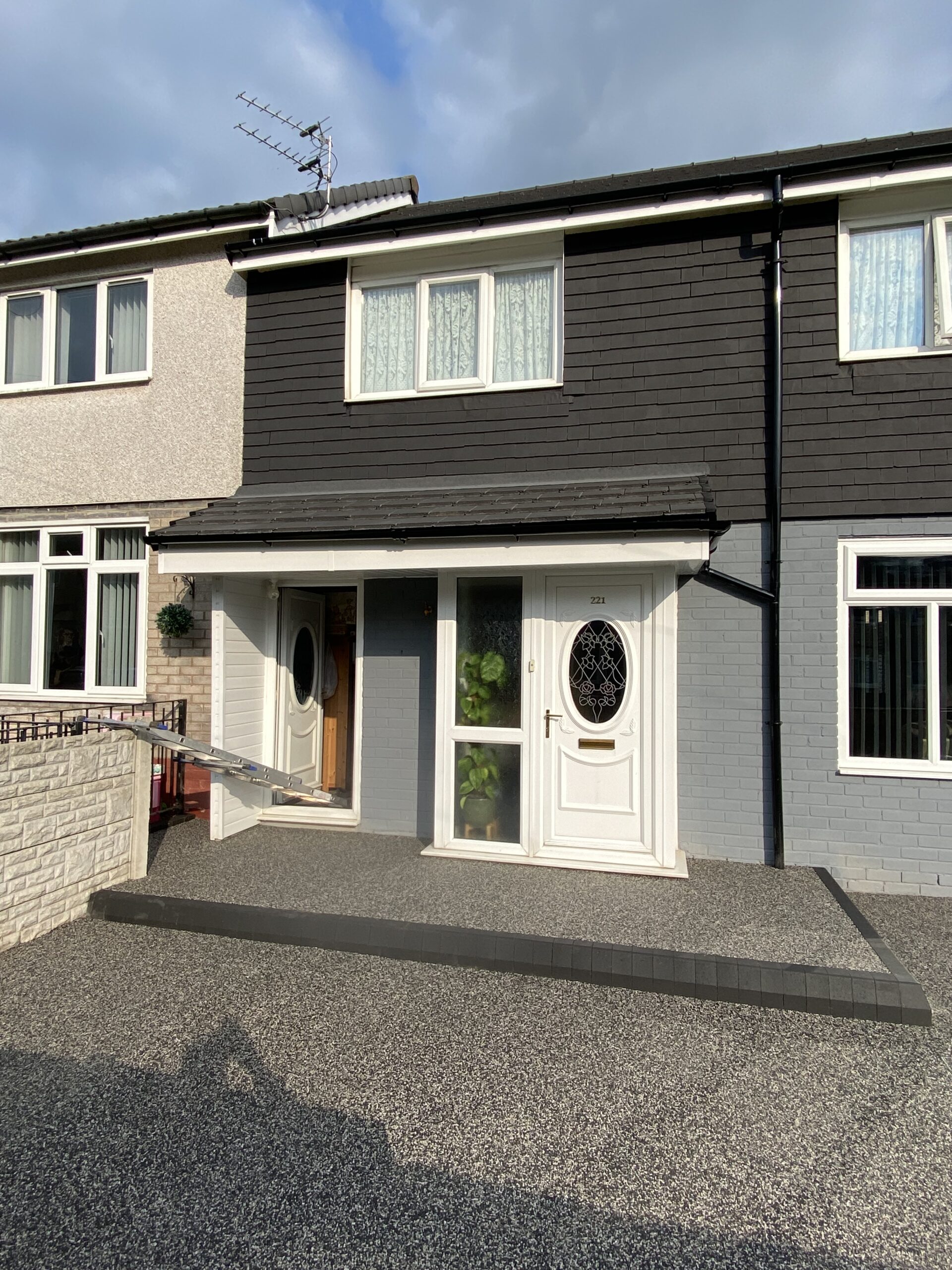 Completed Harlequin resin surface with charcoal edging blocks and new step in Hattersley, Hyde