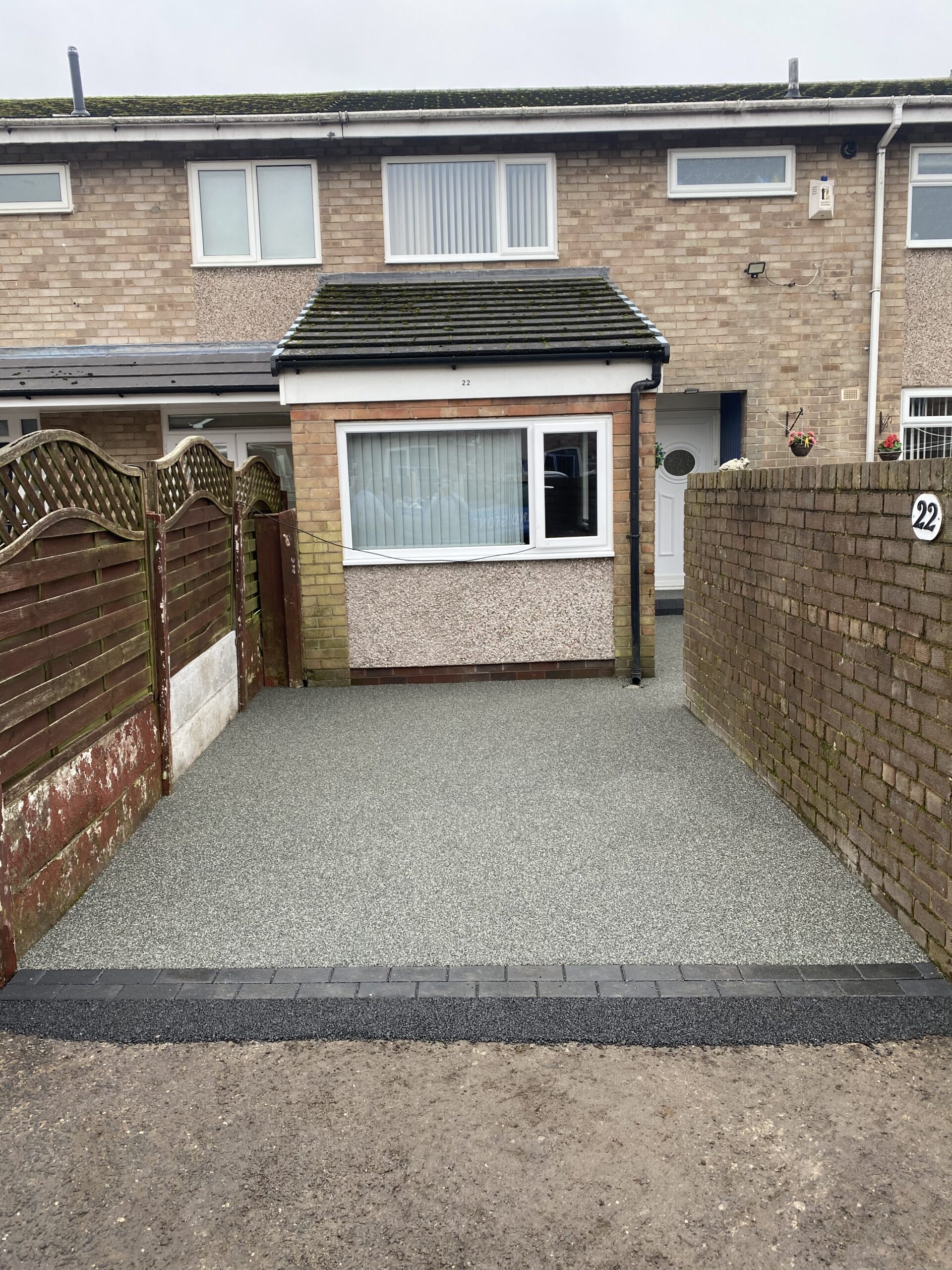 Slate Grey resin driveway project in Hattersley, Hyde with charcoal edging blocks