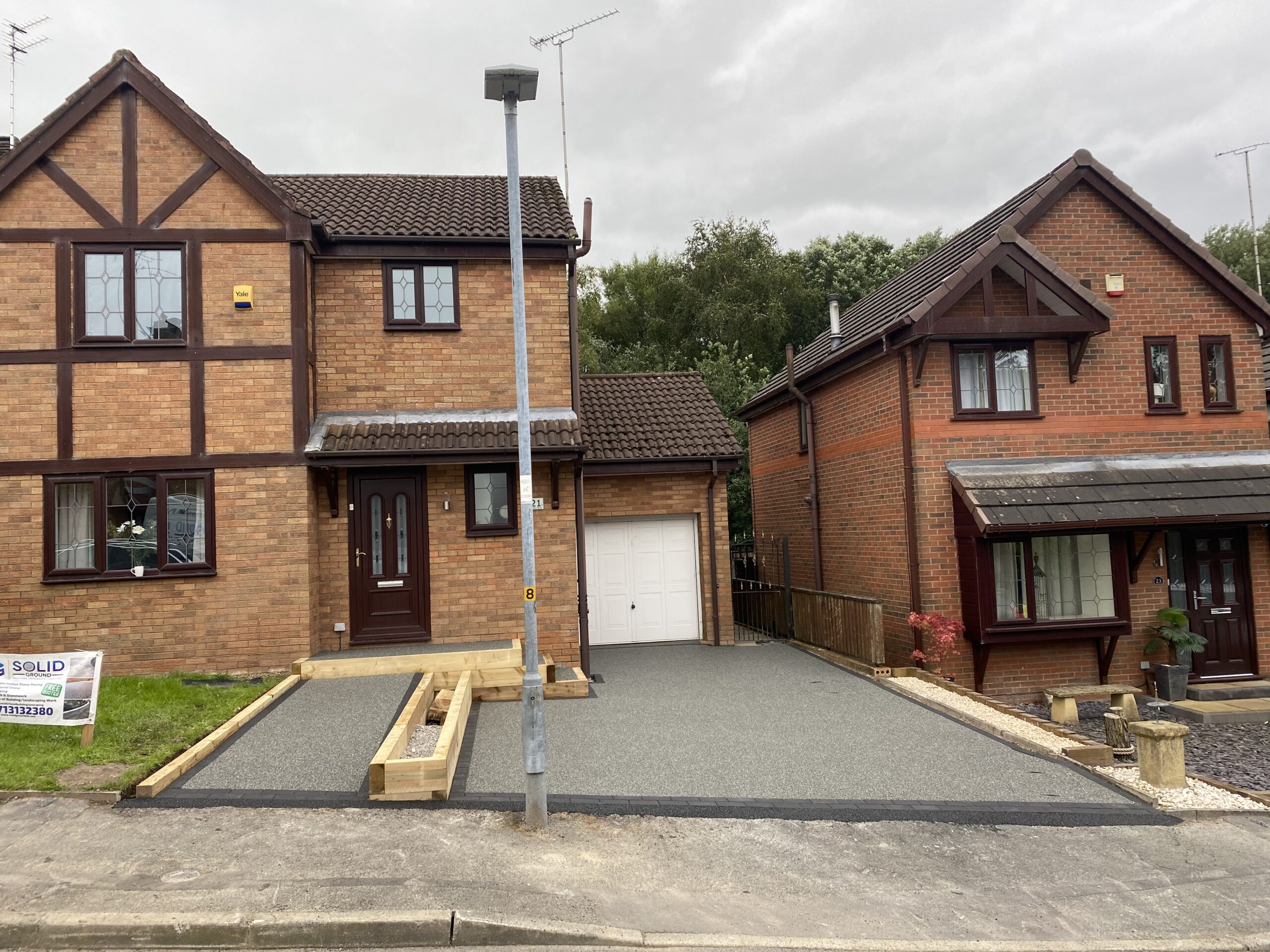 Slate Grey resin driveway and access area completed by Solid Ground in Hyde