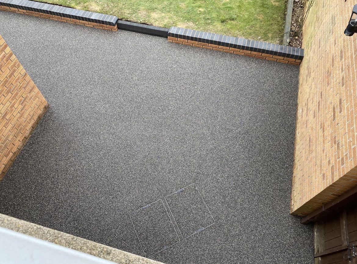 Warrington resin patio project using three grey resin blends