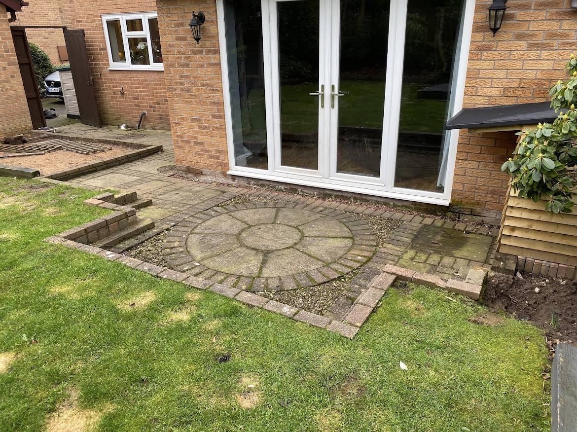 Grey resin patio and new brickwork project completed by Solid Ground in Warrington