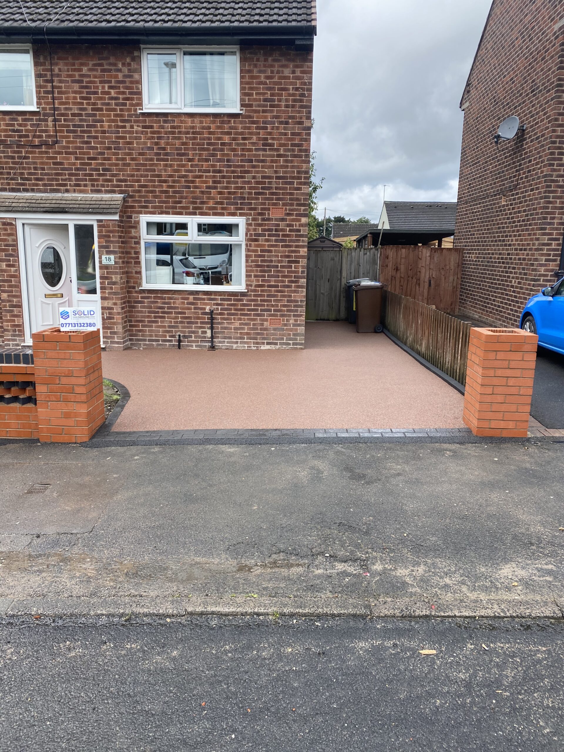Completed Sorrento resin driveway and new garden wall in Newton, Hyde