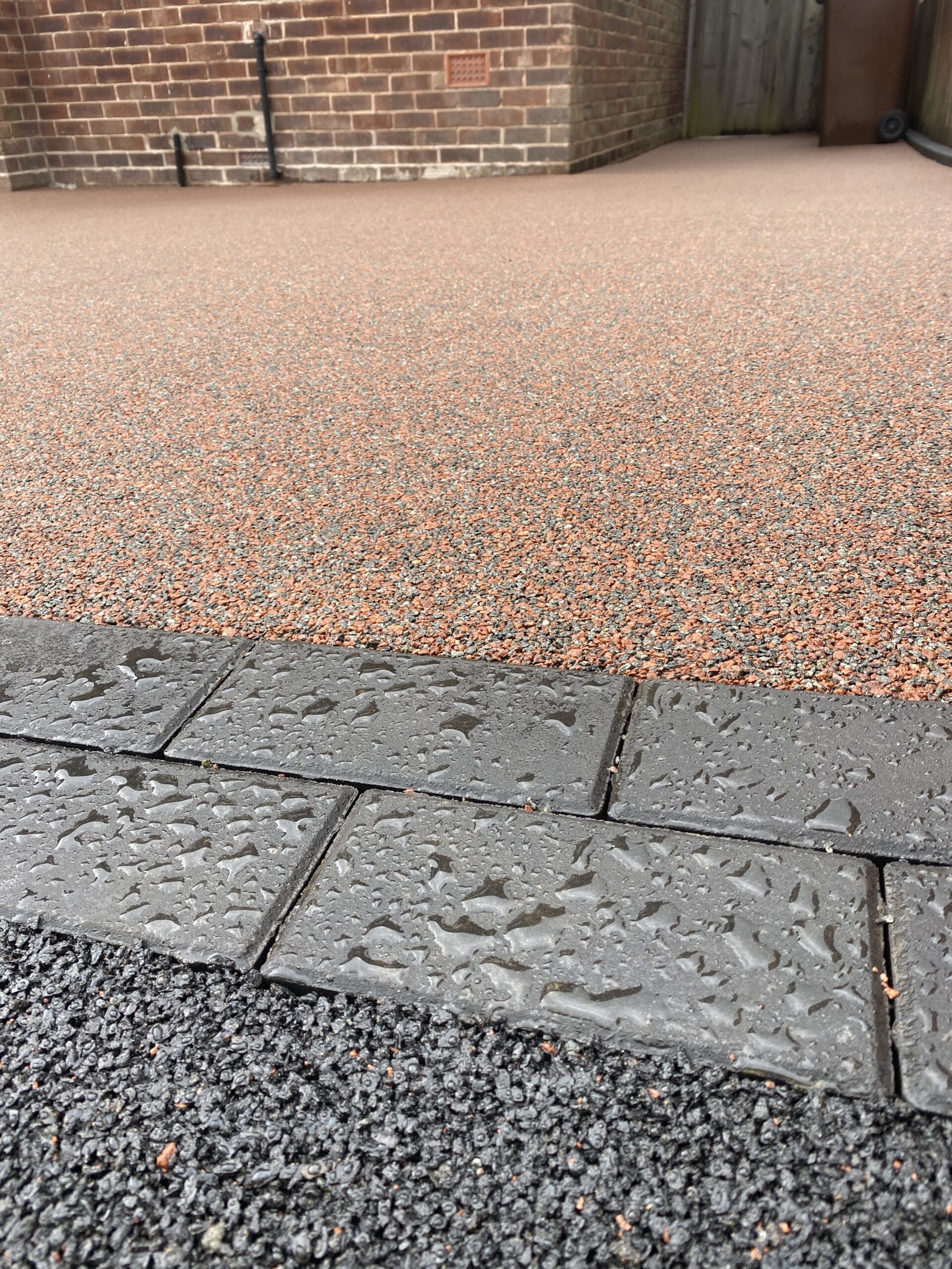 Sorrento resin driveway in Newton, Hyde with charcoal edging blocks