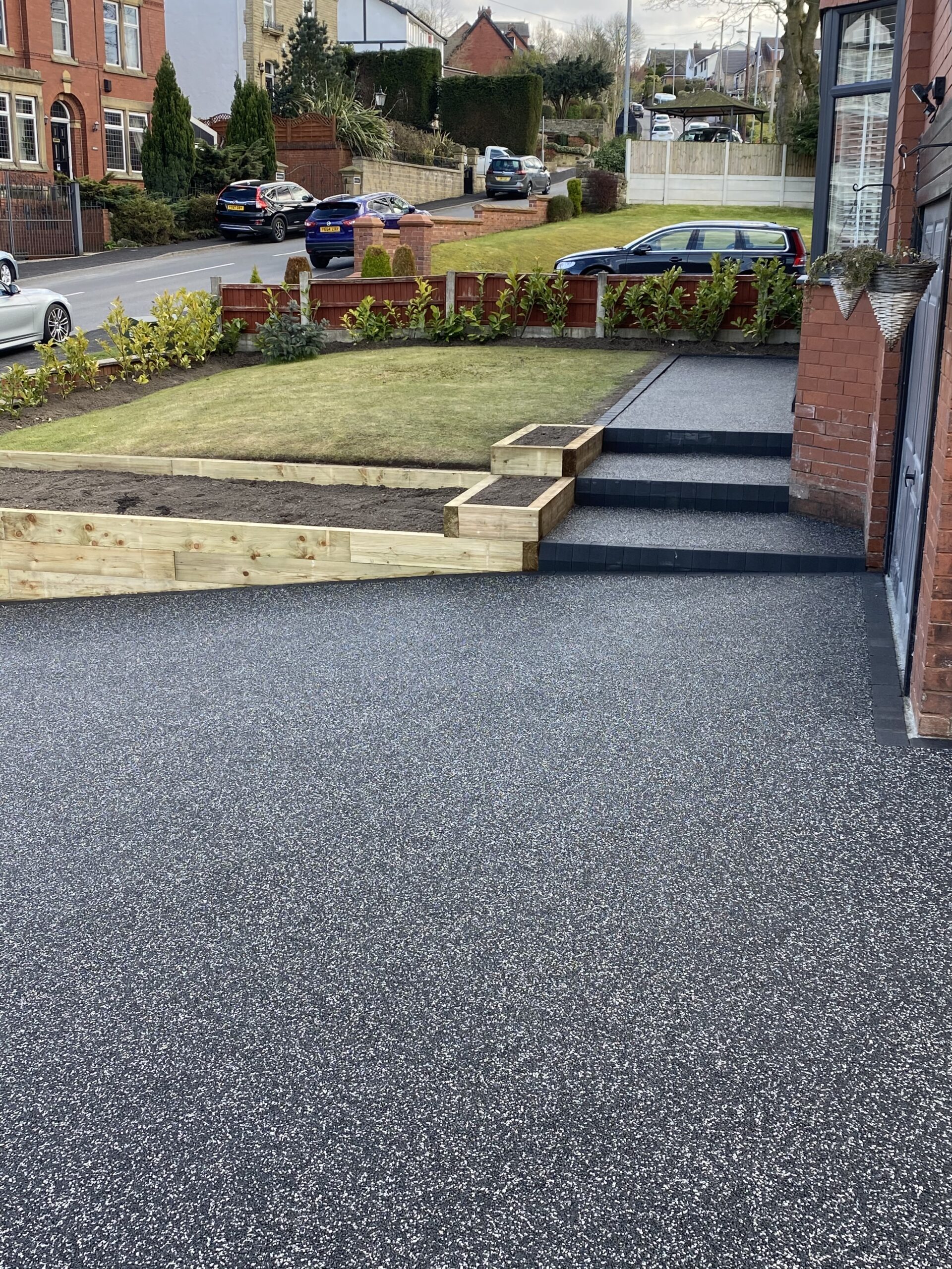 80m² Eclipse resin driveway with charcoal edging, steps and landscaping in Stalybridge
