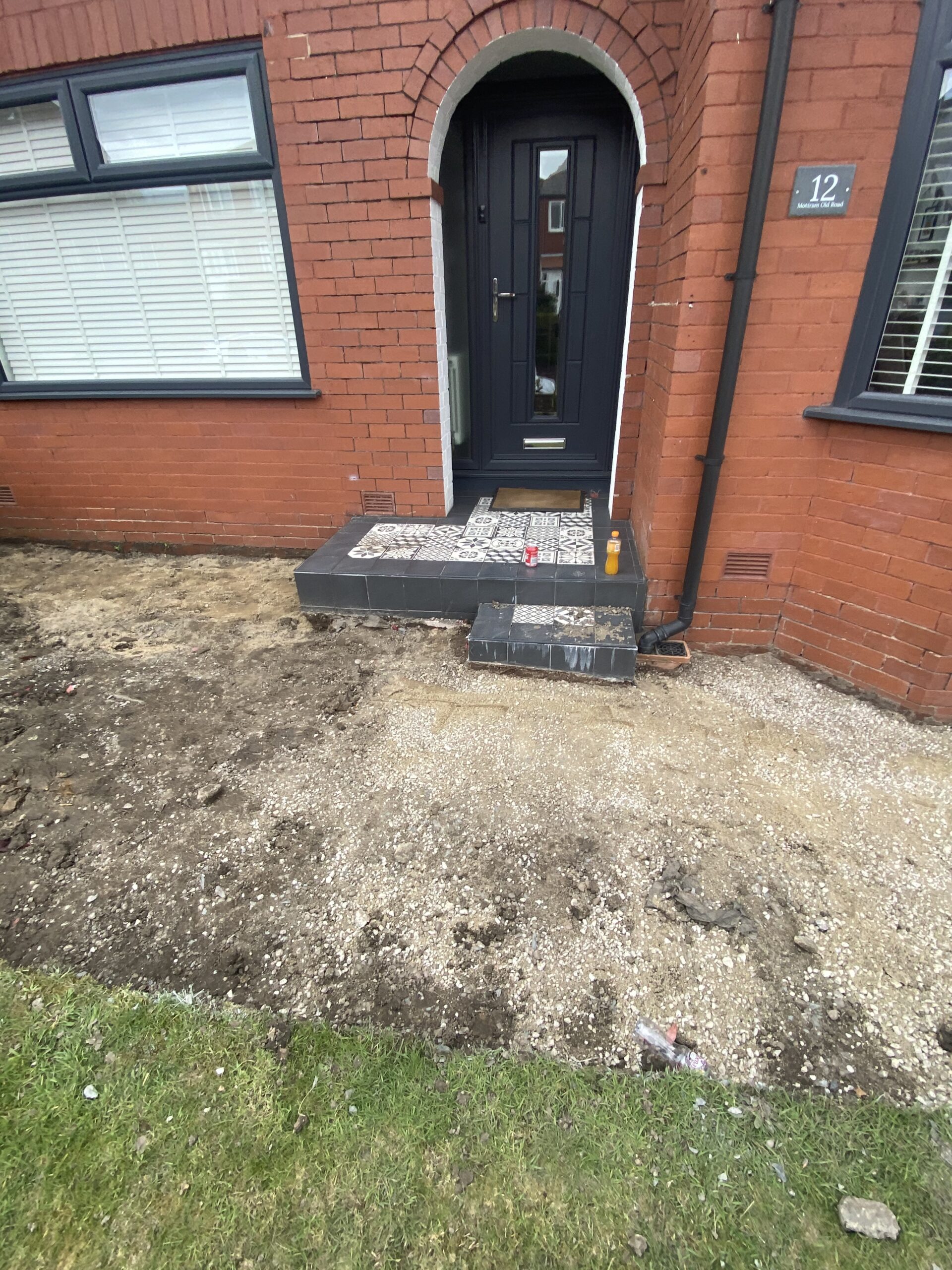Full rip-out preparation for an 80m² Eclipse resin driveway installation in Stalybridge