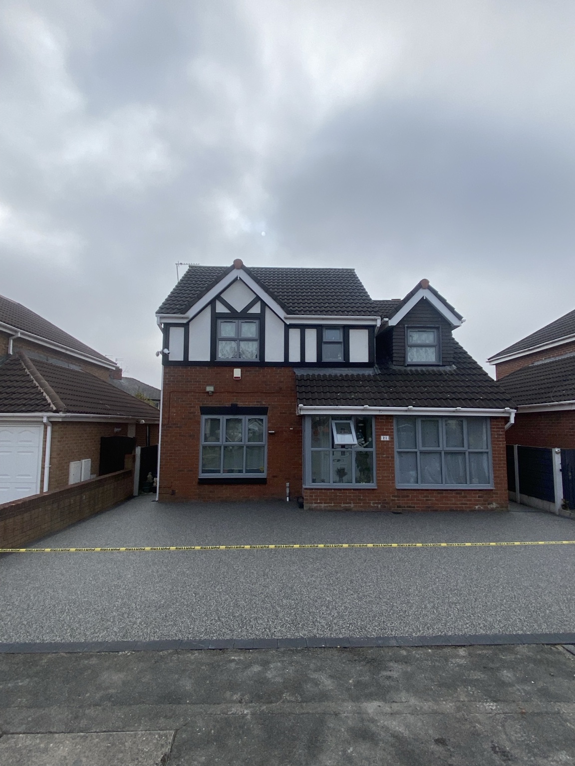 Finished 45m² Eclipse resin-bound driveway with charcoal border blocks in Ashton-under-Lyne