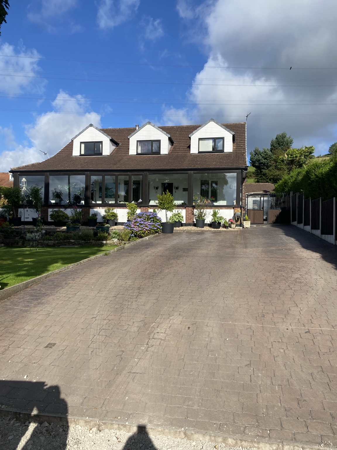 Existing patterned driveway in Hyde before an 85m² Eclipse resin overlay