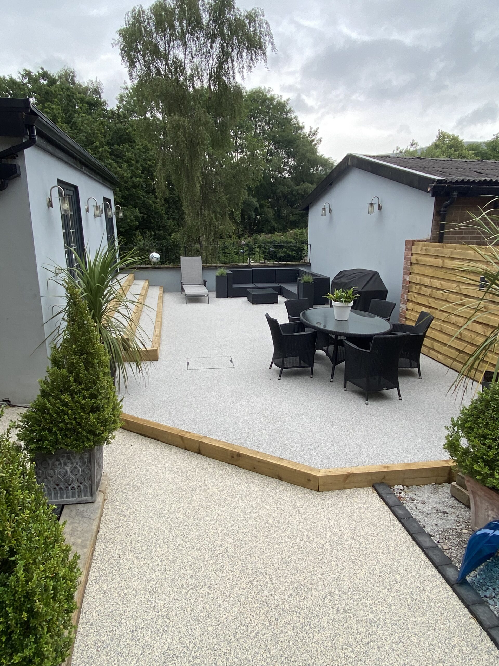 Stalybridge resin patio using bespoke Spanish marble blend with charcoal border blocks